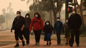 family evacuating wildfire