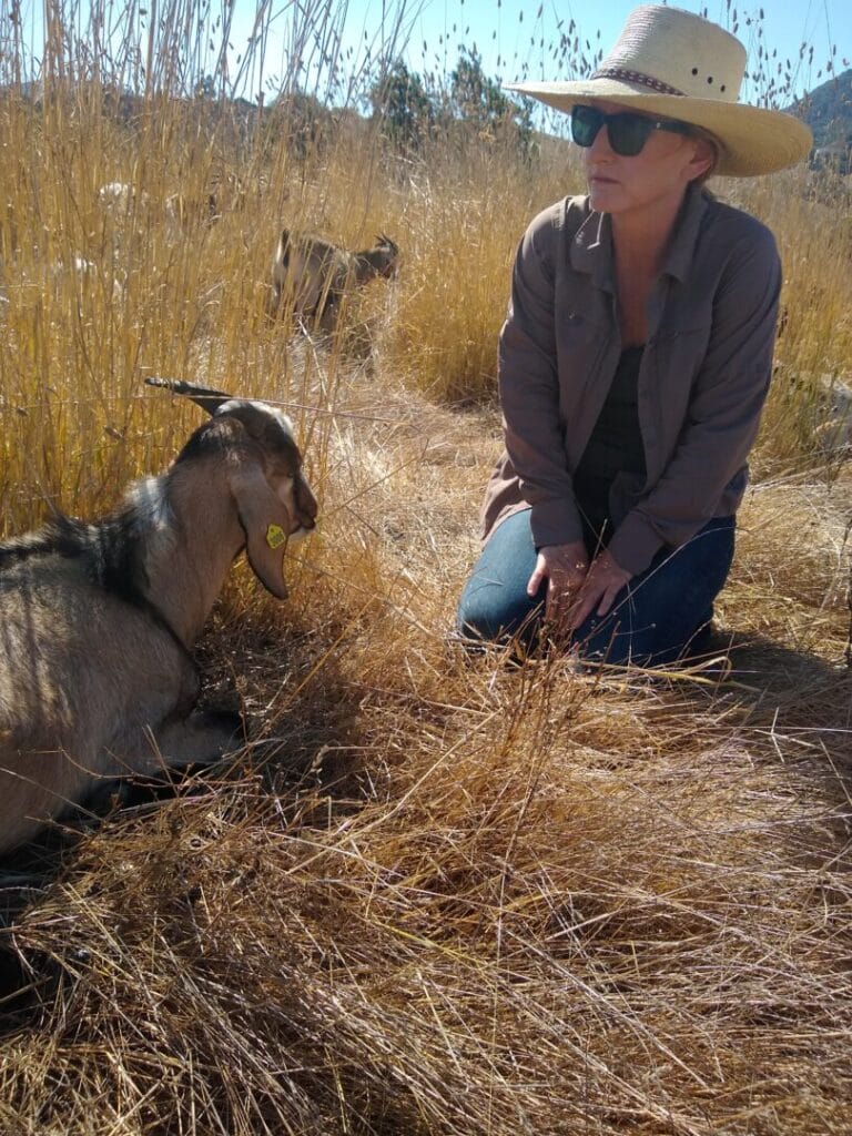 Beth with a goat
